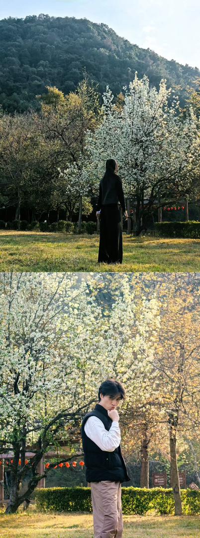 Group of students smiling and sitting together on the grass